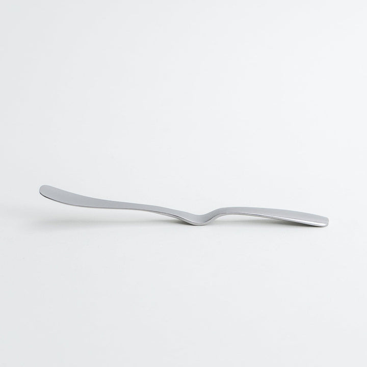 Stainless steel jam spreader with a sleek, double-ended design.