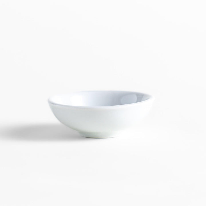 White ceramic incense holder featuring a charming sleeping calico cat figurine, offering a playful yet elegant design that enhances any incense experience with a touch of warmth and serenity.