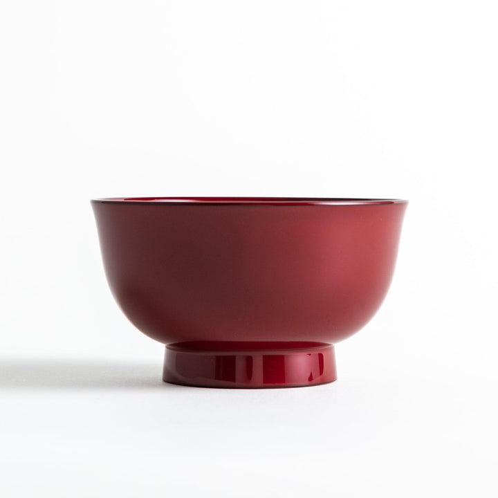 A smooth, glossy lacquer bowl with a minimalist design, perfect for soups or side dishes. Available in red and black.