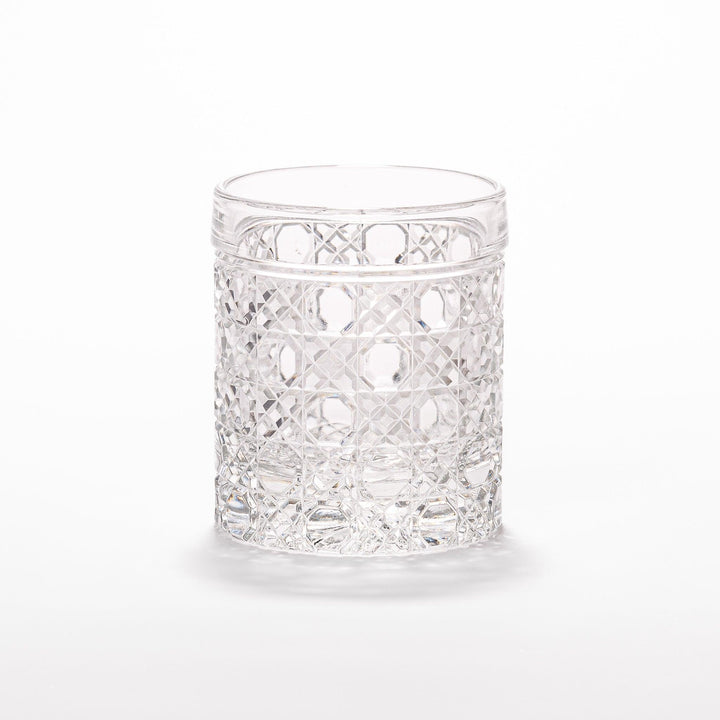Classic rocks glass with an intricate lattice cut design, perfect for serving whiskey or other spirits with a sophisticated touch.