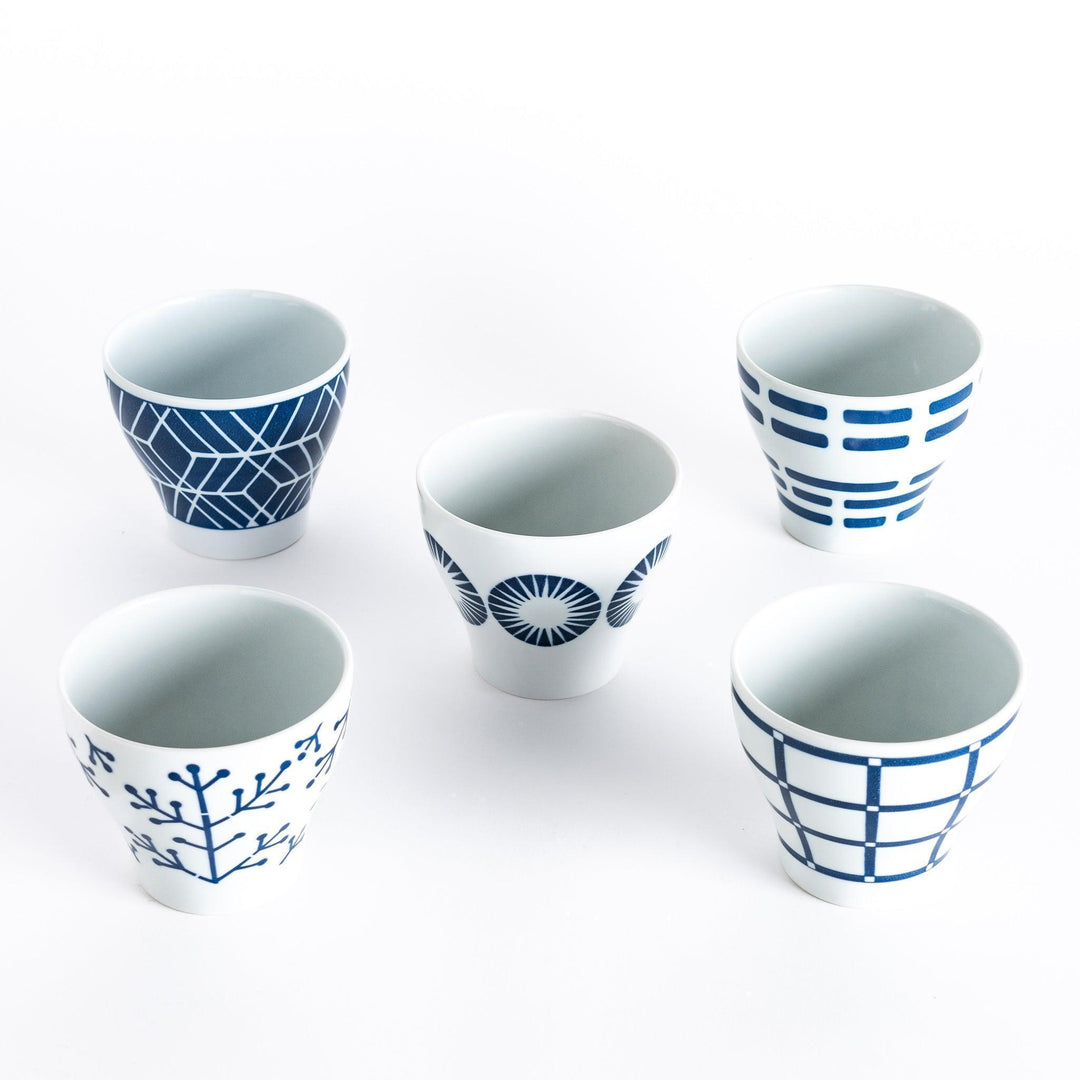 Five Modern Indigo Cups arranged with different geometric patterns.