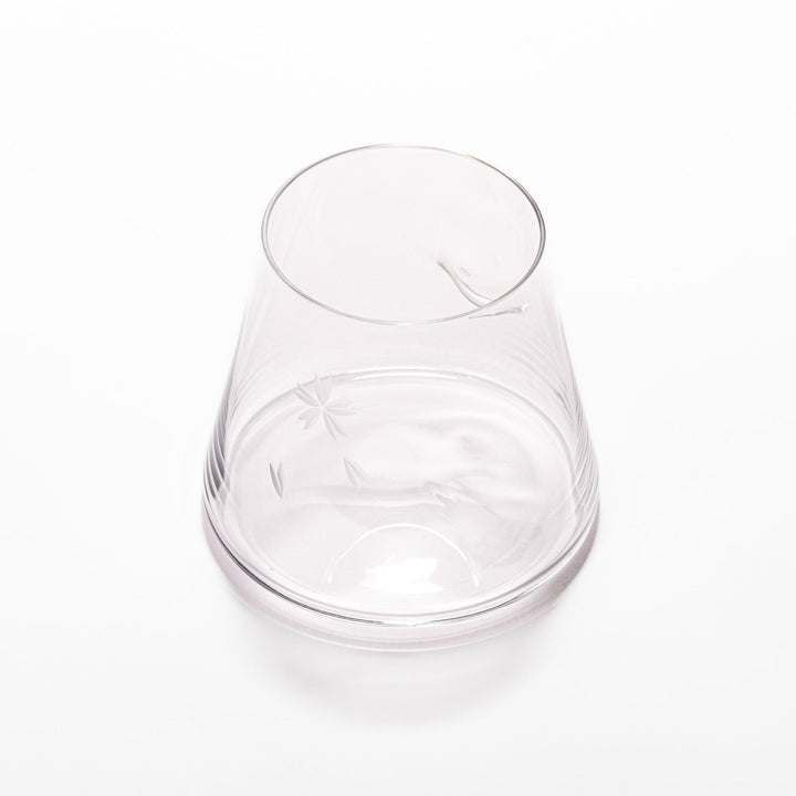 Mount Fuji–inspired beer glass with flared base and delicate etched cherry blossom design, perfect for enjoying craft beer in style.