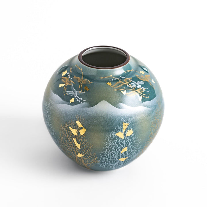 Handcrafted vase featuring a tranquil mountain scene with golden leaf accents and delicate trees, capturing a serene, nature-inspired design in soft teal tones.