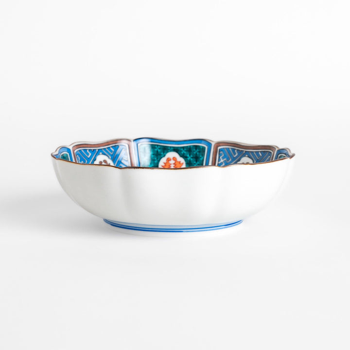 Cereal Bowl featuring a vibrant bird perched on blossoming sakura flowers, framed by intricate blue patterns.