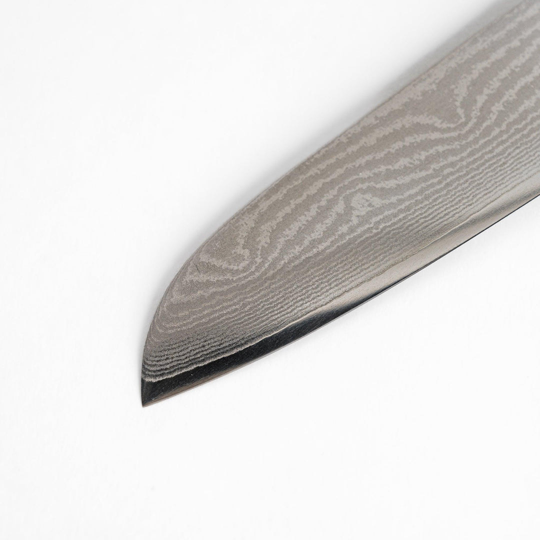 A high-quality Nagomi Damascus Santoku knife featuring a beautifully patterned blade and a striped wooden handle, offering both elegance and precision for all your culinary needs.