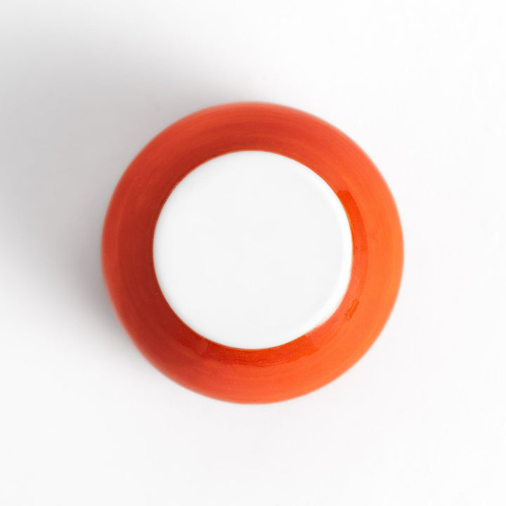 Persimmon Lidded Condiment Bowl, a ceramic bowl with a glossy orange finish and a detailed lid shaped like a persimmon leaf, perfect for serving sauces and condiments.