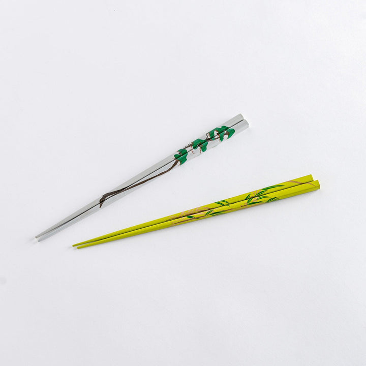 Chopsticks with traditional pine and bamboo patterns arranged side by side, reflecting elegant and timeless craftsmanship.