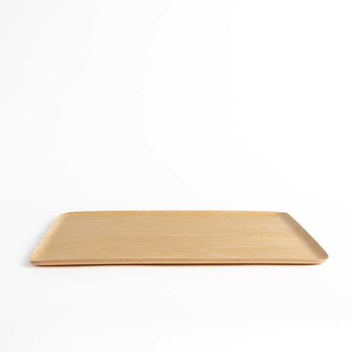 Light brown wooden serving tray with a minimalist design, perfect for serving meals, snacks, or drinks with a touch of natural simplicity.