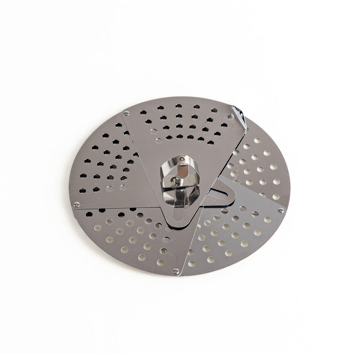 Adjustable stainless steel drop lid, a versatile kitchenware tool with foldable petals for steaming, simmering, and preventing boil-overs in various pot sizes.