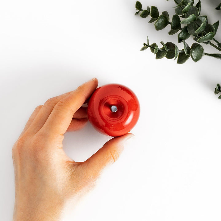 Red Apple Lidded Condiment Bowl, a charming apple-shaped ceramic bowl with a glossy red finish and a small black stem, perfect for serving sauces and condiments.