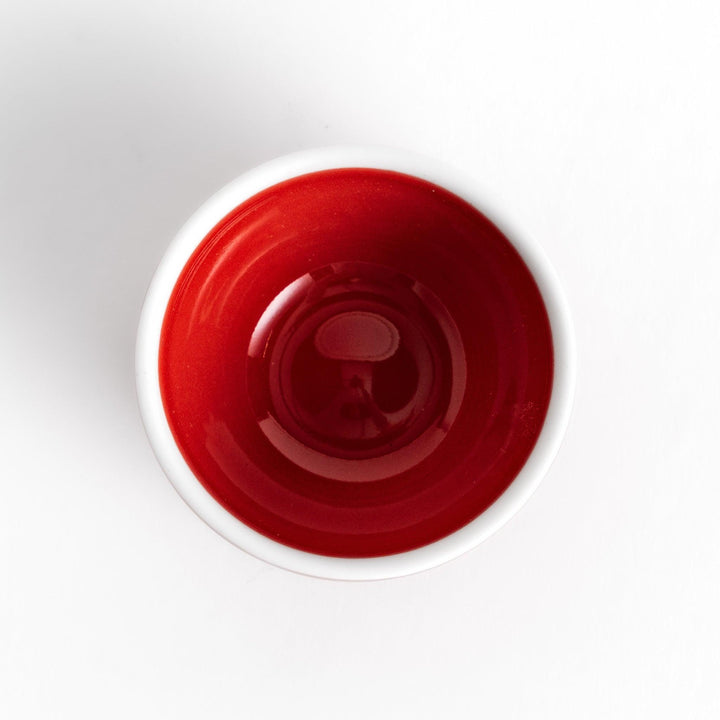 Red Apple Lidded Condiment Bowl, a charming apple-shaped ceramic bowl with a glossy red finish and a small black stem, perfect for serving sauces and condiments.