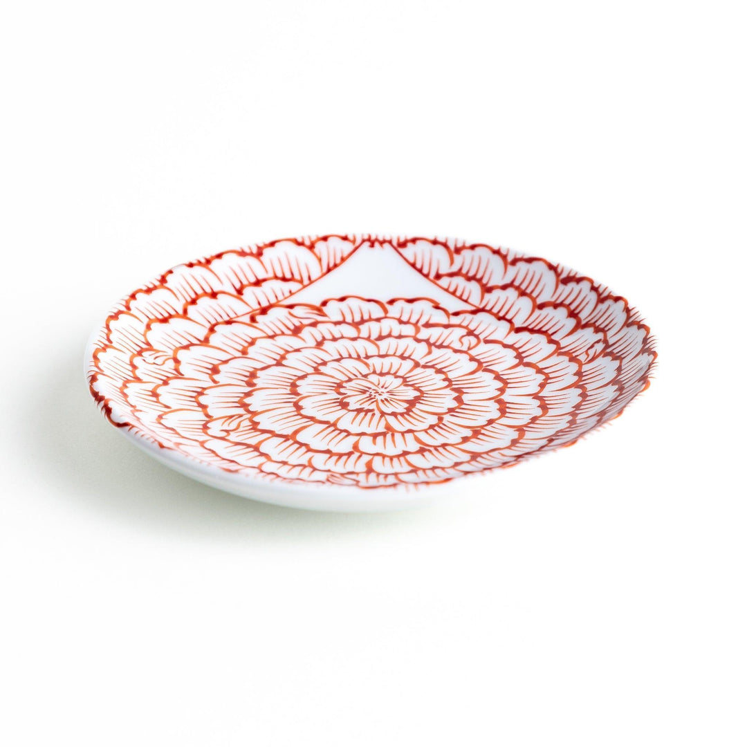 Round plate with a red chrysanthemum petal design.