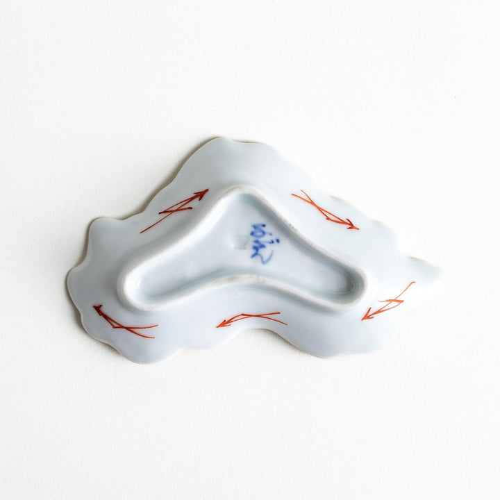 Orange chrysanthemum-shaped plate with gold outlining