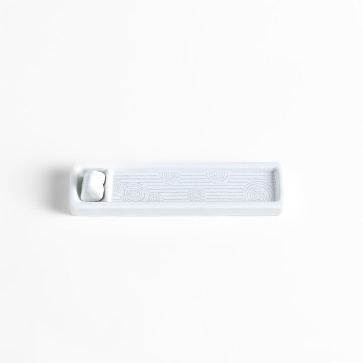 Zen-inspired white ceramic Incense Holder featuring a raked sand pattern.