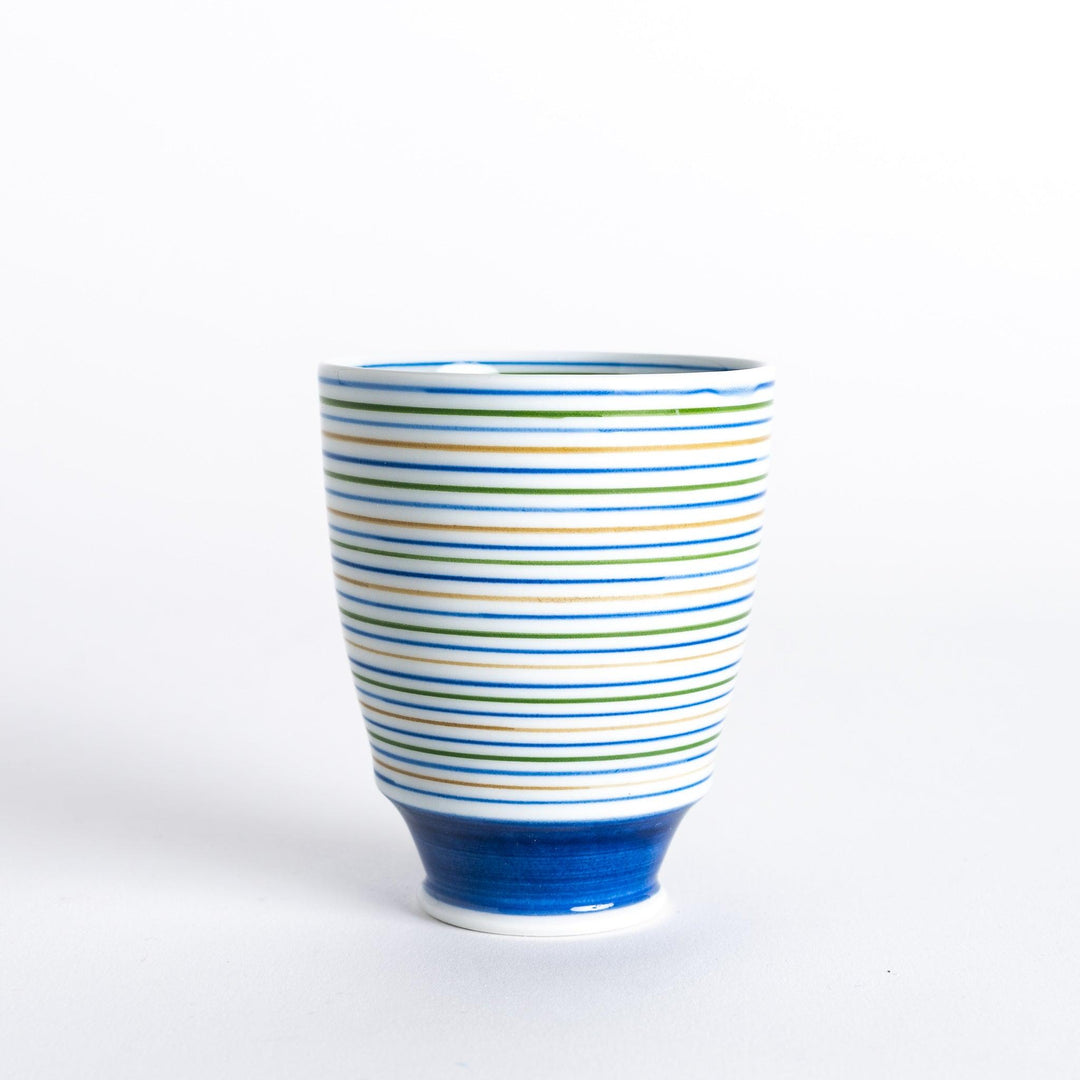 Side view of the Serene Striped Tea Cup, showcasing the vibrant blue, green, and yellow stripes and the blue base.