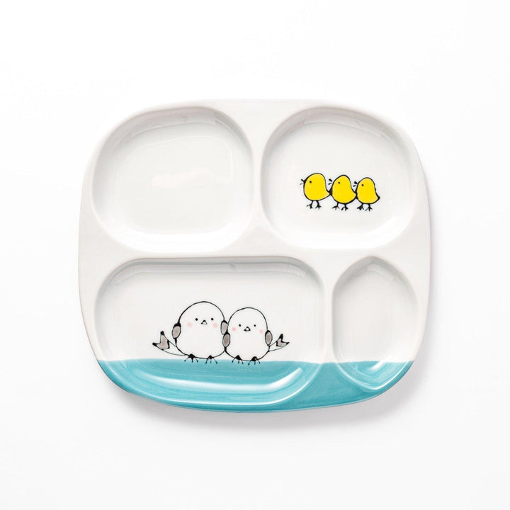 Adorable kids' plate featuring two snowbirds at the bottom and three yellow chicks at the top, with a light blue accent, perfect for brightening up mealtime.