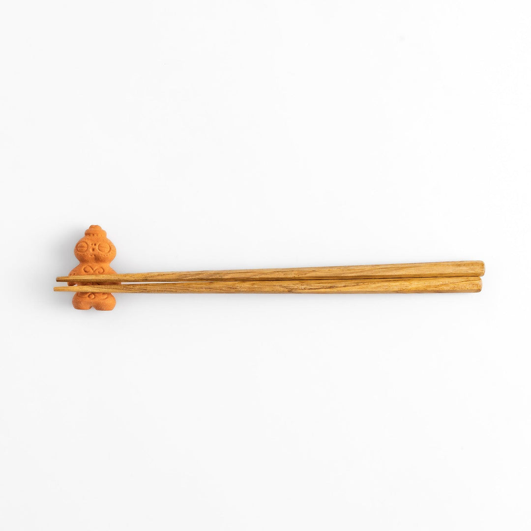 Chopstick rest designed as a spiritual shaman figure, featuring intricate details that evoke a sense of mysticism and charm.