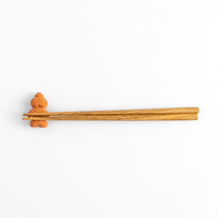Chopstick rest designed as a spiritual shaman figure, featuring intricate details that evoke a sense of mysticism and charm.