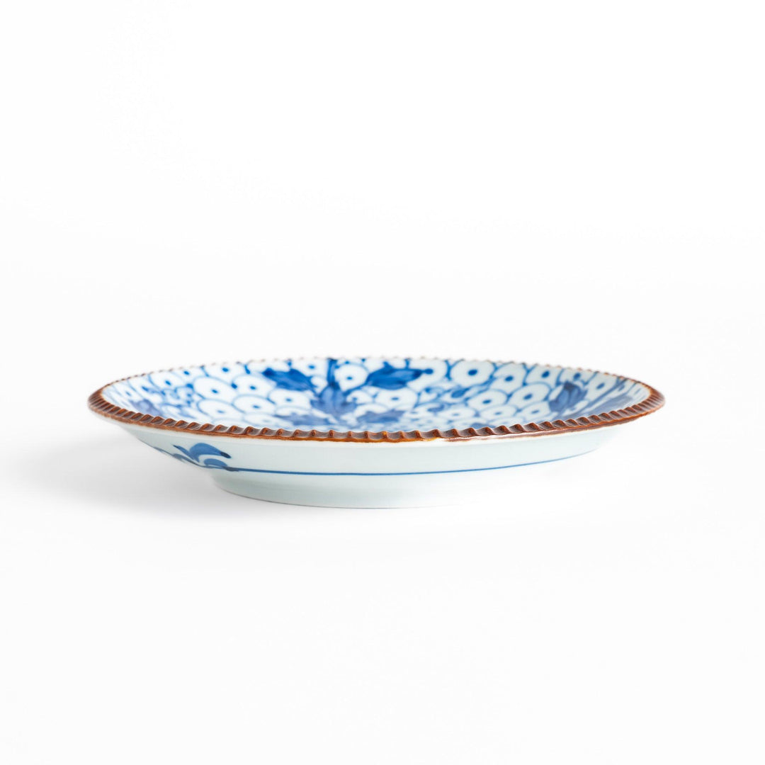 Dessert Plate featuring a beautiful blue spotted floral design with a delicate, beaded rim for an elegant touch.