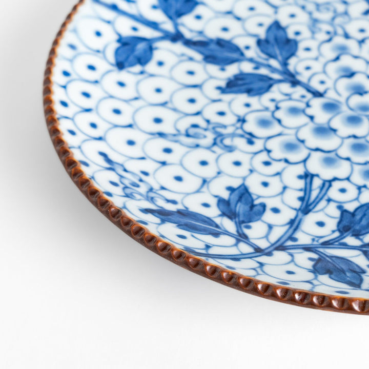 Salad Plate featuring a delicate blue spotted floral design with a beaded rim for an elegant touch.