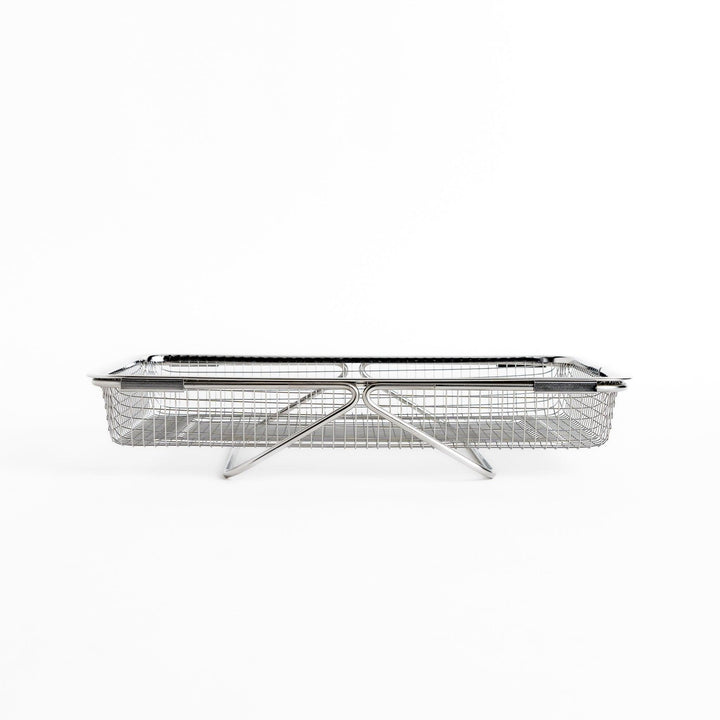 Durable stainless steel draining basket with a fine mesh design, perfect for draining liquids from food during preparation or cooking.