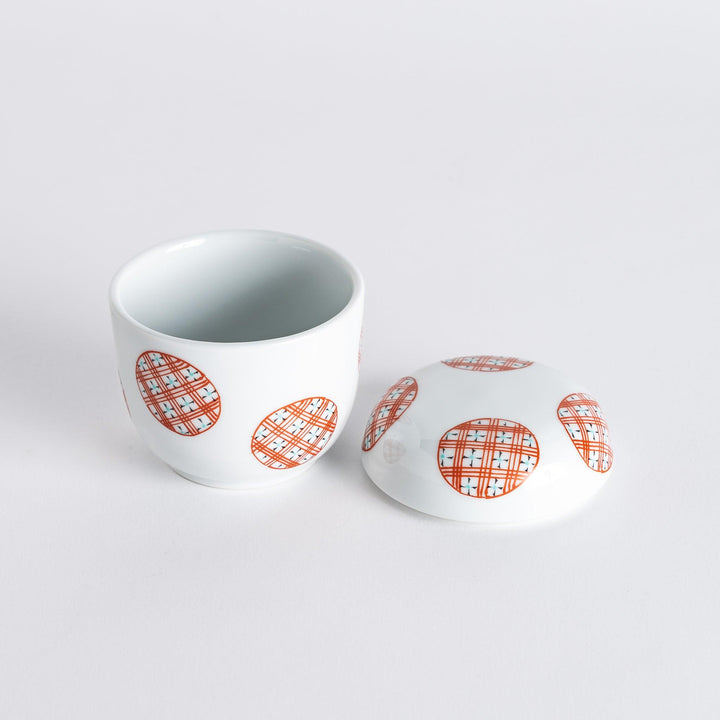 The bowl open with its lid beside, revealing its spacious interior for serving savory dishes.