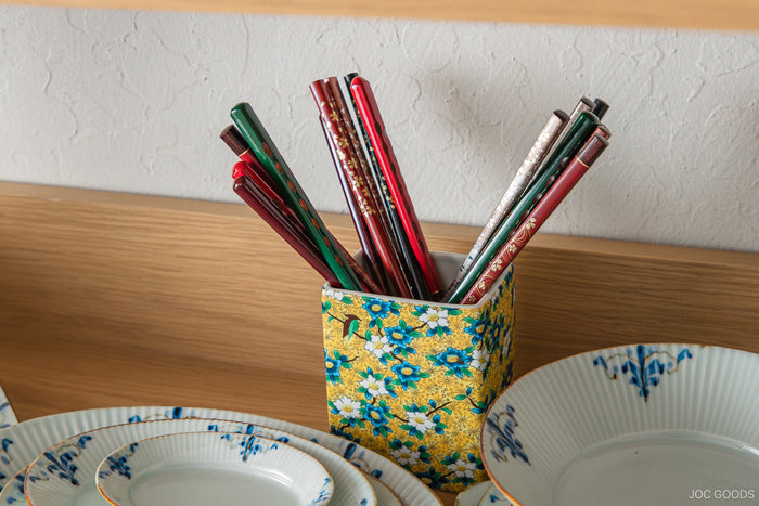 Japanese chopsticks in a colorful vase