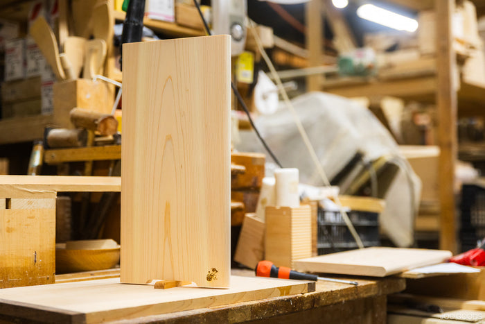 a cutting board standing straight up