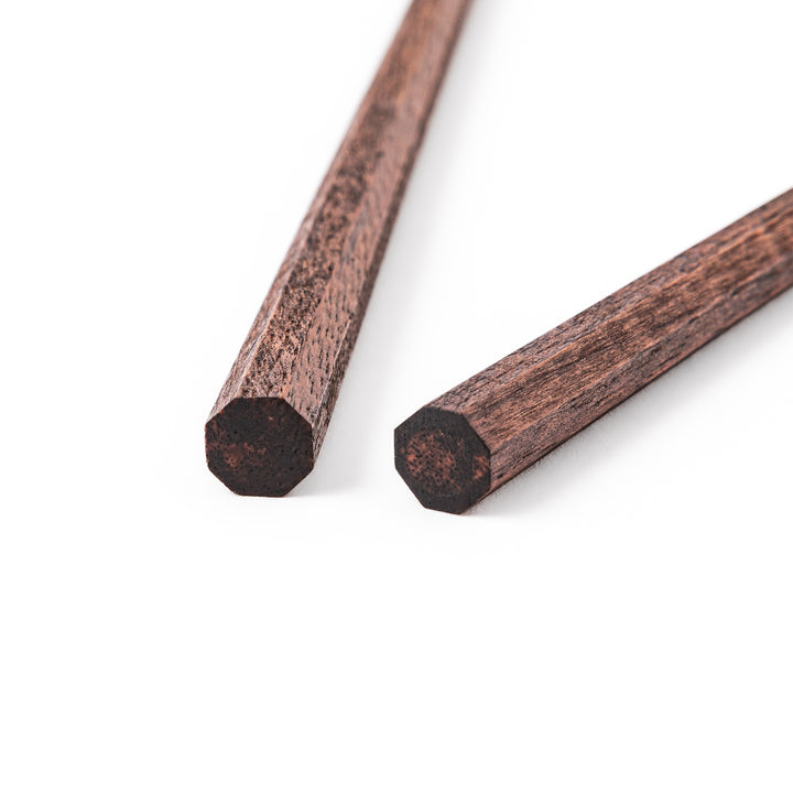 Octagonal natural wood Japanese chopsticks with a textured grip at the tips specifically designed for eating ramen noodles