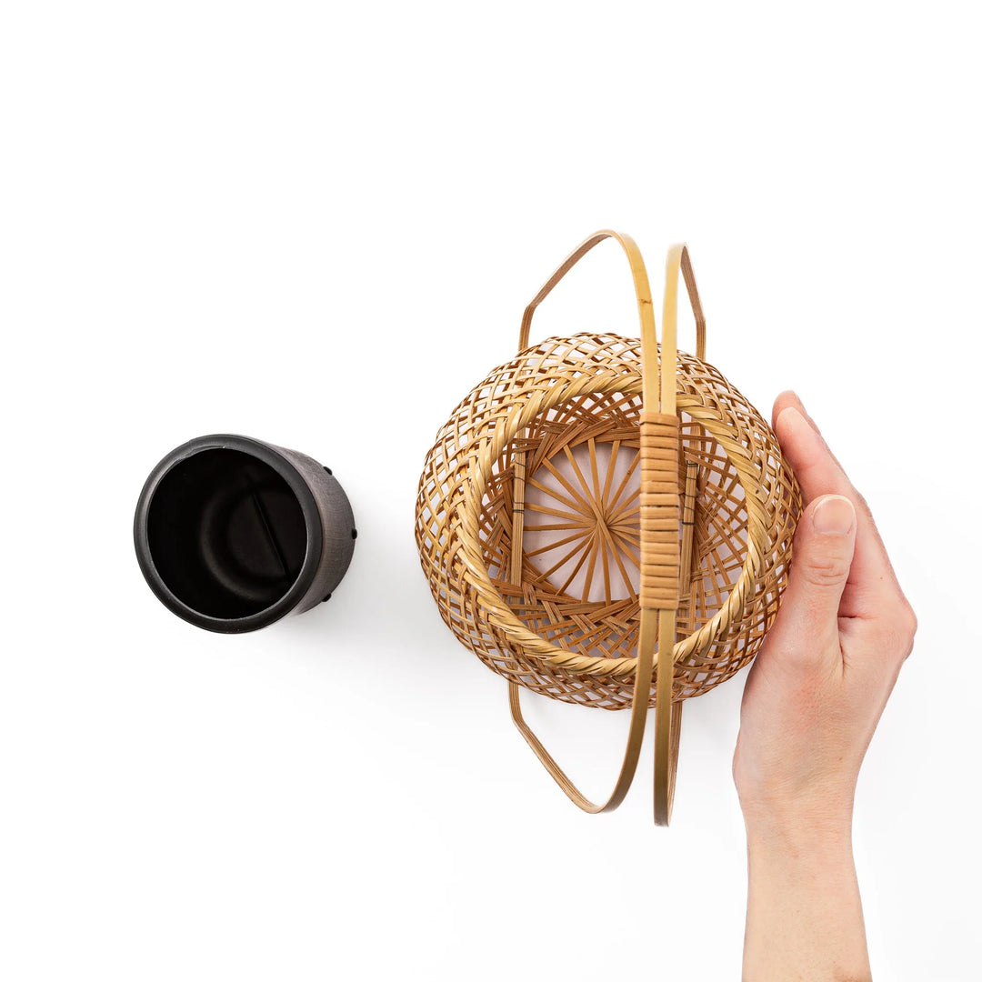 Japanese bamboo Ikebana basket vase set with a removable black inner water container for fresh flower displays