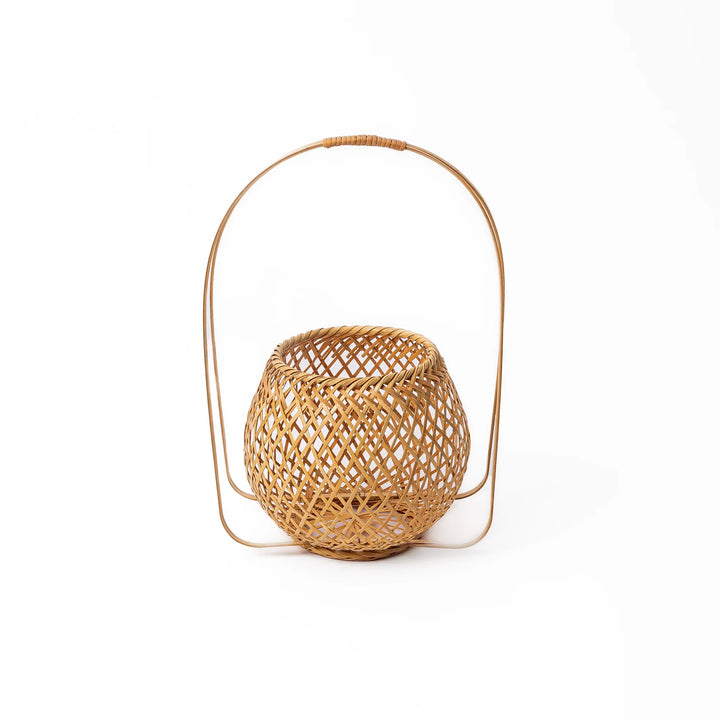 Handwoven Japanese bamboo Ikebana flower basket with a tall arched handle for traditional floral arrangements