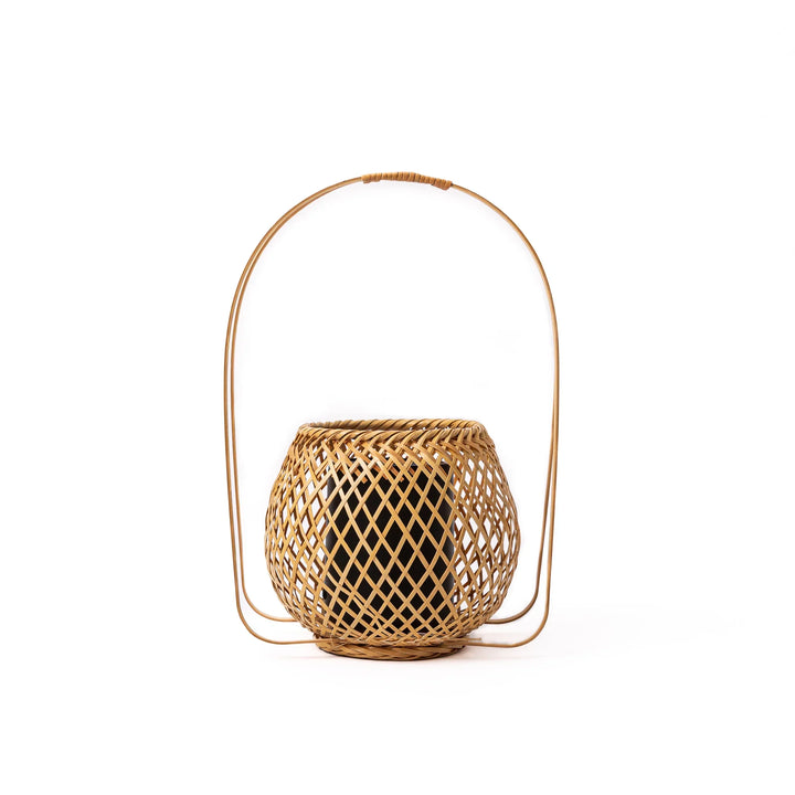 Handwoven Japanese bamboo Ikebana flower basket with a tall arched handle for traditional floral arrangements