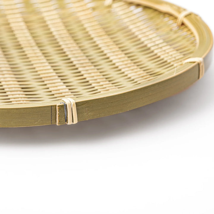 Traditional flat Japanese bamboo zaru strainer basket for serving cold soba noodles or rinsing vegetables