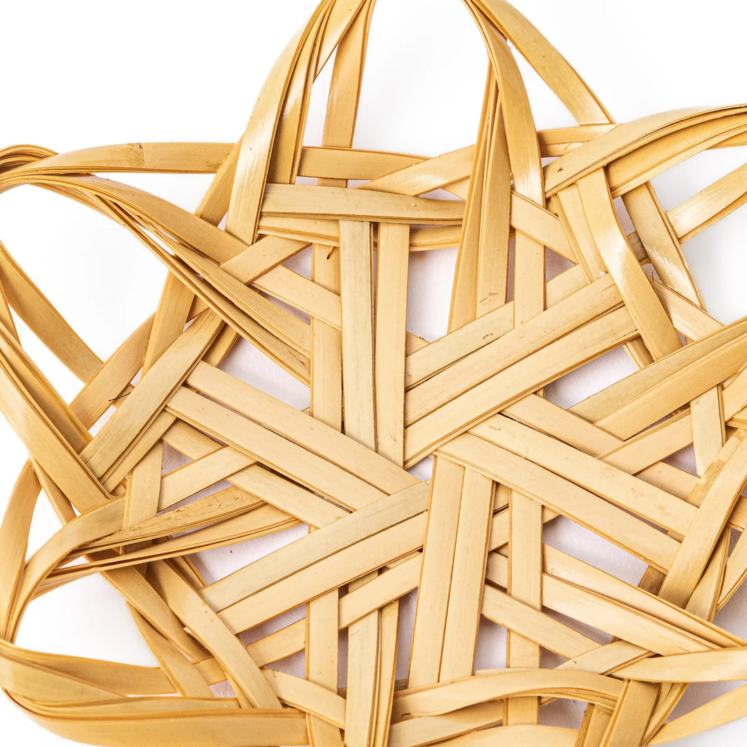 Handwoven star shaped Japanese bamboo flower tea coaster for elegant table decor and traditional green tea service