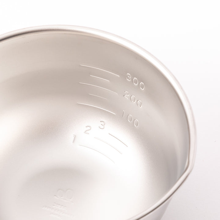 AUX Japanese Mini Measuring Bowl with Handle displayed against a plain white background