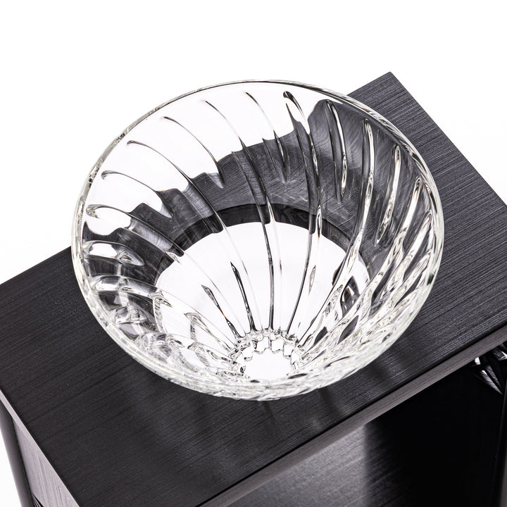 Japanese wood coffee dripper stand with Asanoha kumiko pattern in black finish, including a glass funnel and server