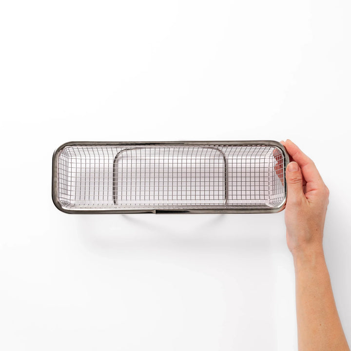 Stainless steel rectangular strainer basket with handles for draining noodles or frying in Japanese cooking.