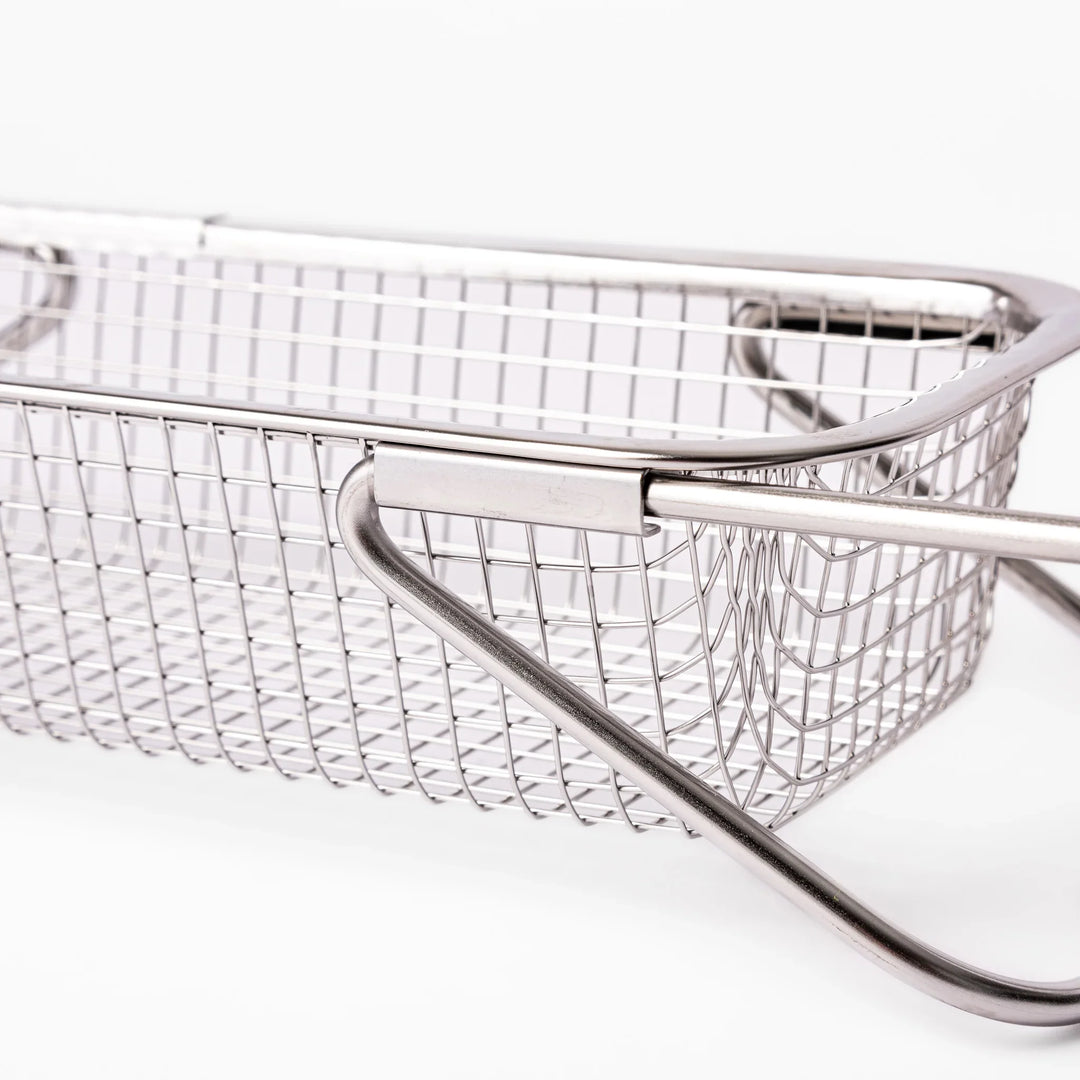 Stainless steel rectangular strainer basket with handles for draining noodles or frying in Japanese cooking.