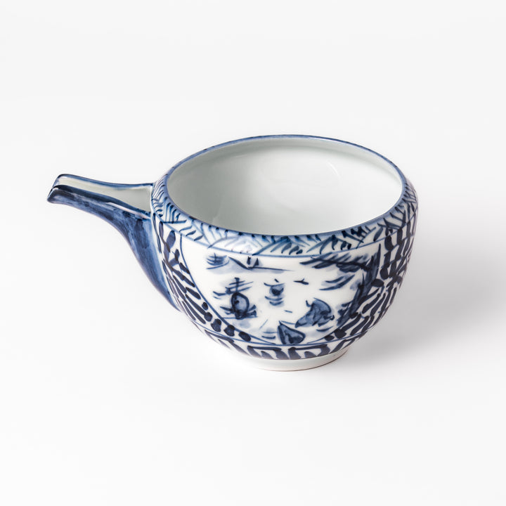 Porcelain sake pourer with spout featuring hand-painted indigo landscape and arabesque patterns in a traditional Japanese style.