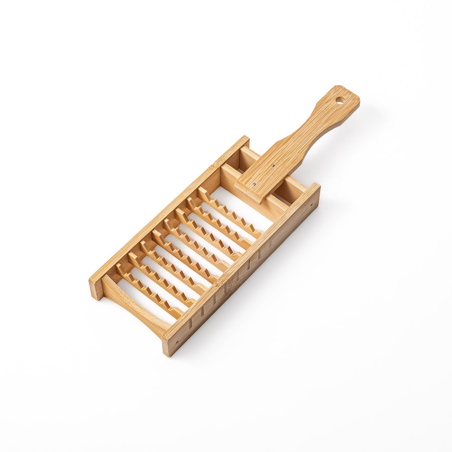 Traditional Japanese bamboo Oni Oroshi grater with coarse jagged teeth for grating daikon radish naturally