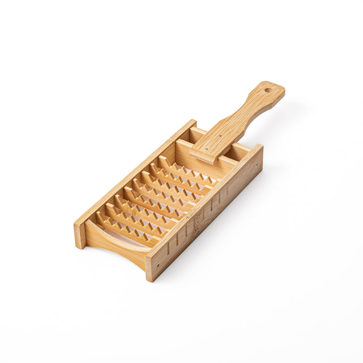 Traditional Japanese bamboo Oni Oroshi grater with coarse jagged teeth for grating daikon radish naturally