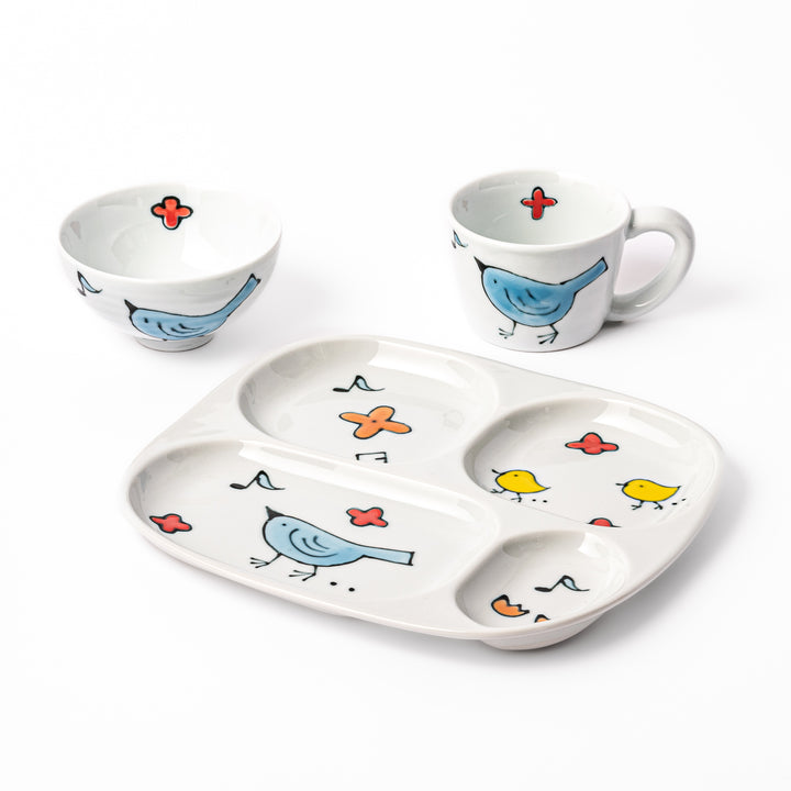 Blue Bird Kids Dinnerware Set featuring a divided plate, rice bowl, and mug with cheerful blue and yellow bird motifs designed to make children’s meals fun and inviting.