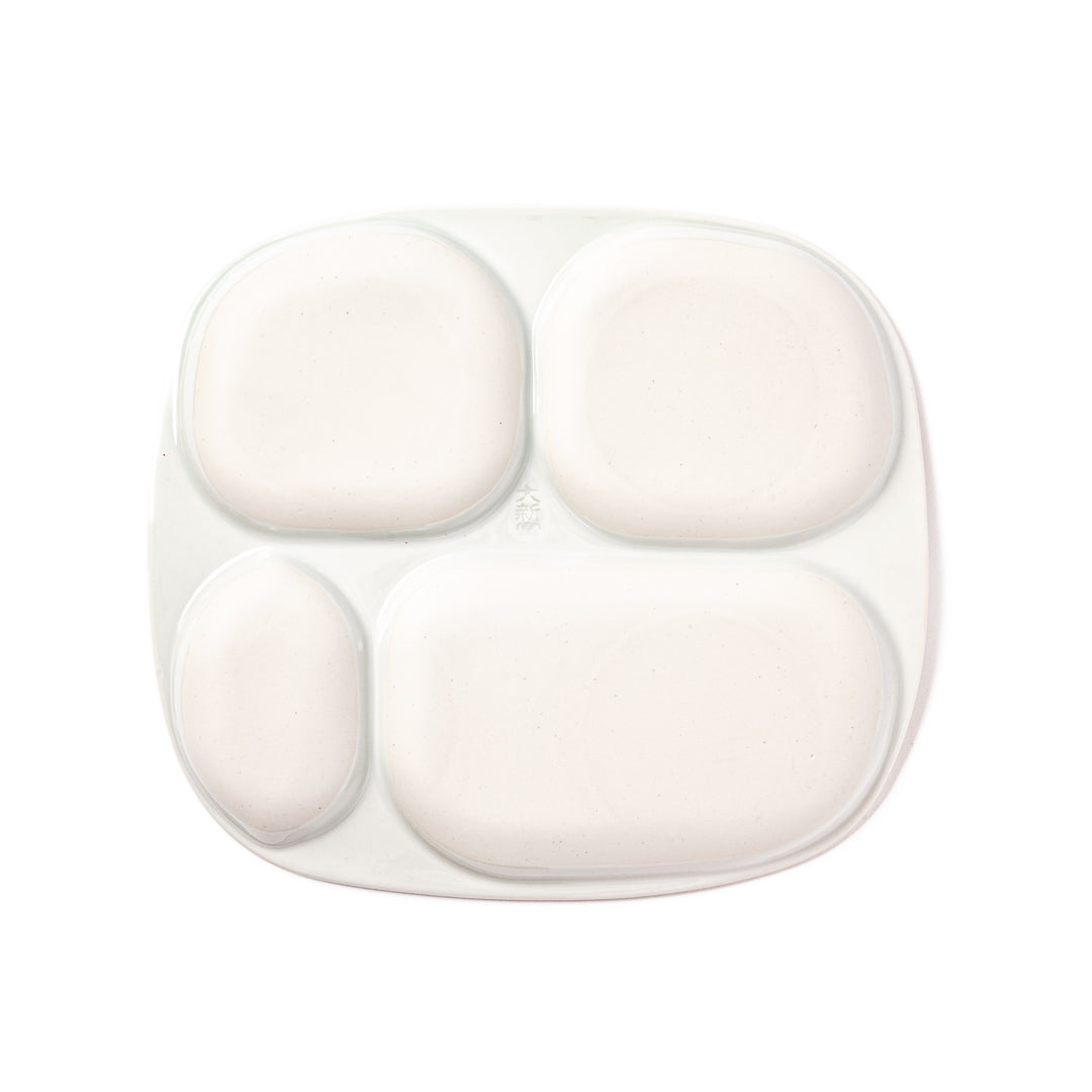 Japanese children’s divided plate decorated with colorful blue and yellow birds, flowers, and musical notes, designed for fun and easy mealtime organization.