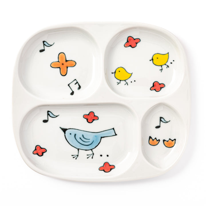 Japanese children’s divided plate decorated with colorful blue and yellow birds, flowers, and musical notes, designed for fun and easy mealtime organization.