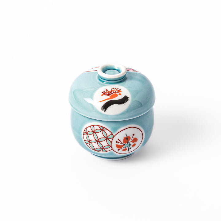 Lidded chawanmushi bowl with a glossy blue glaze and traditional red, black, and white circular patterns on lid and sides.