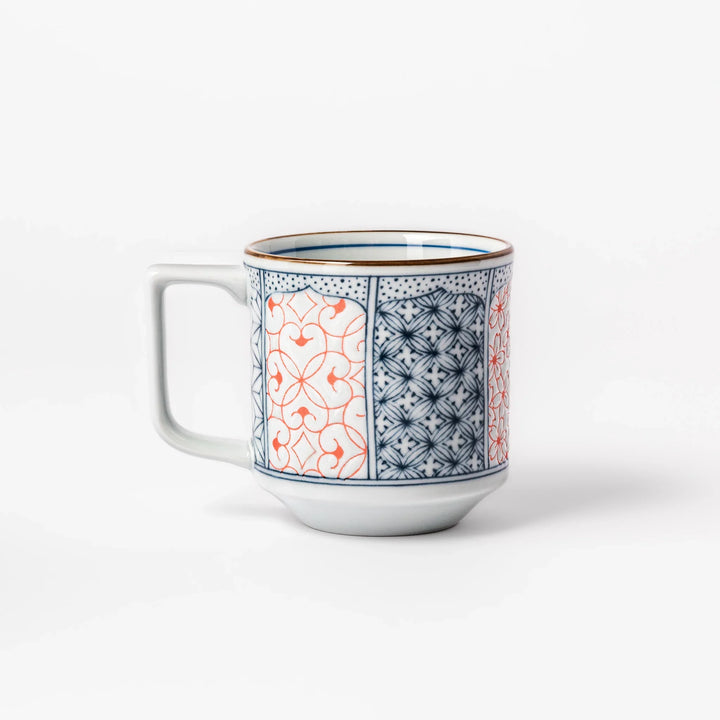 Japanese porcelain mug featuring Hokusai Great Wave and red-blue geometric patterns, crafted with elegant traditional design.