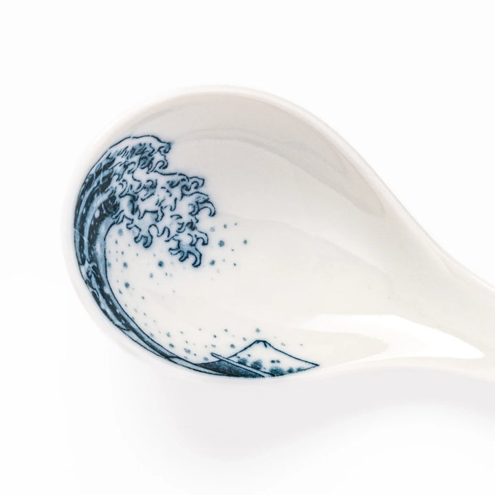 Japanese porcelain ramen spoon featuring Hokusai Great Wave and Mount Fuji design in classic blue and white style.