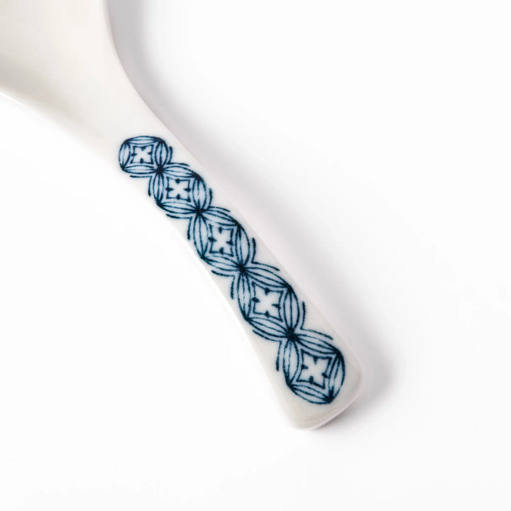 Japanese porcelain ramen spoon featuring Hokusai Great Wave and Mount Fuji design in classic blue and white style.