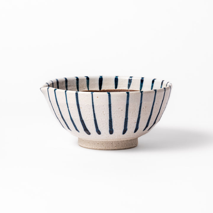 White ceramic suribachi mortar with vertical blue stripes and a textured brown interior, ideal for grinding sesame seeds and traditional Japanese seasonings.