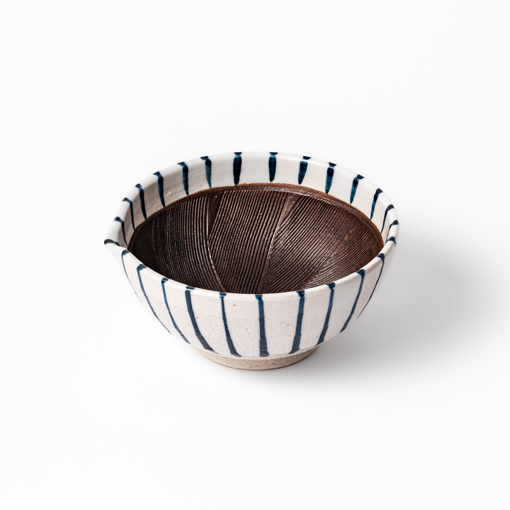 White ceramic suribachi mortar with vertical blue stripes and a textured brown interior, ideal for grinding sesame seeds and traditional Japanese seasonings.